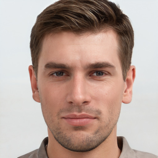 Neutral white young-adult male with short  brown hair and grey eyes