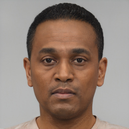 Neutral black young-adult male with short  black hair and brown eyes