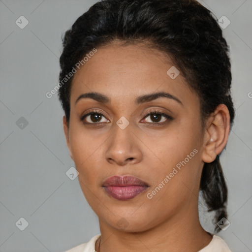 Joyful latino young-adult female with short  brown hair and brown eyes