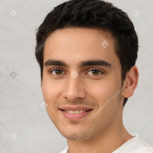 Joyful white young-adult male with short  brown hair and brown eyes