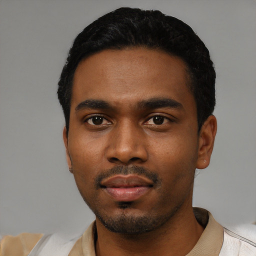Neutral black young-adult male with short  black hair and brown eyes