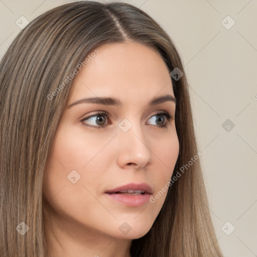 Neutral white young-adult female with long  brown hair and brown eyes