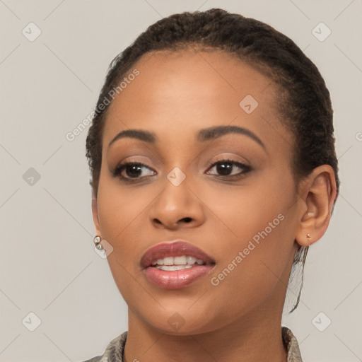 Joyful latino young-adult female with short  brown hair and brown eyes