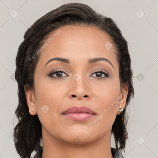 Joyful latino young-adult female with medium  brown hair and brown eyes