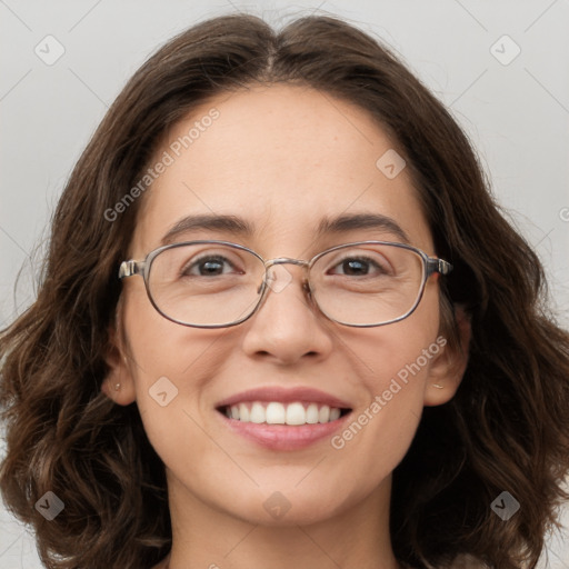 Joyful white adult female with long  brown hair and brown eyes