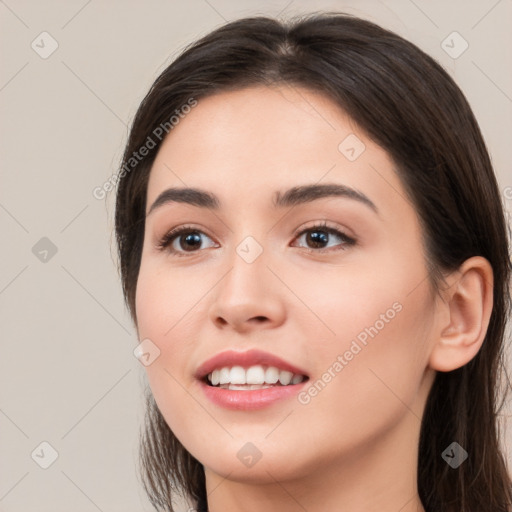 Joyful white young-adult female with long  brown hair and brown eyes