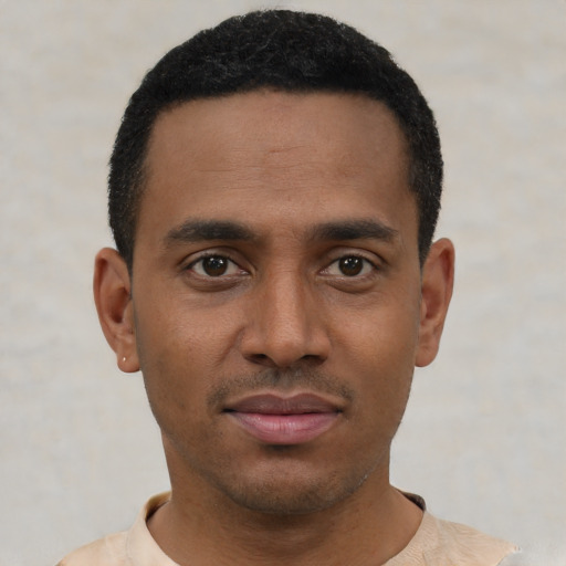 Neutral latino young-adult male with short  black hair and brown eyes