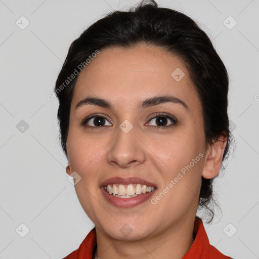 Joyful white young-adult female with medium  black hair and brown eyes