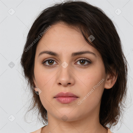 Neutral white young-adult female with medium  brown hair and brown eyes