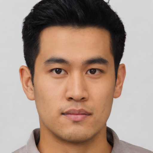 Neutral asian young-adult male with short  black hair and brown eyes