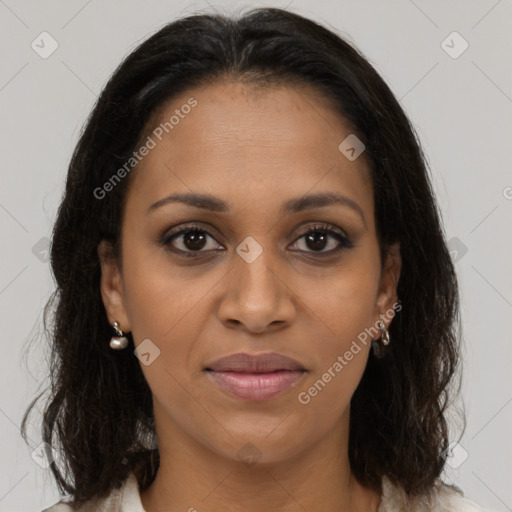 Joyful black young-adult female with medium  brown hair and brown eyes