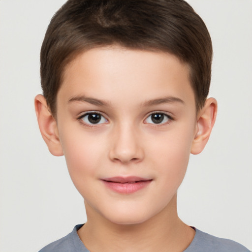 Joyful white child female with short  brown hair and brown eyes