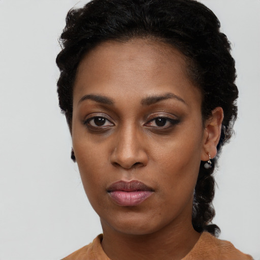 Neutral black young-adult female with short  black hair and brown eyes