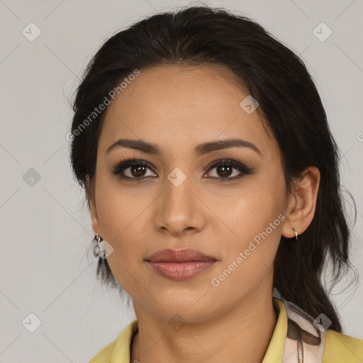 Joyful latino young-adult female with medium  brown hair and brown eyes