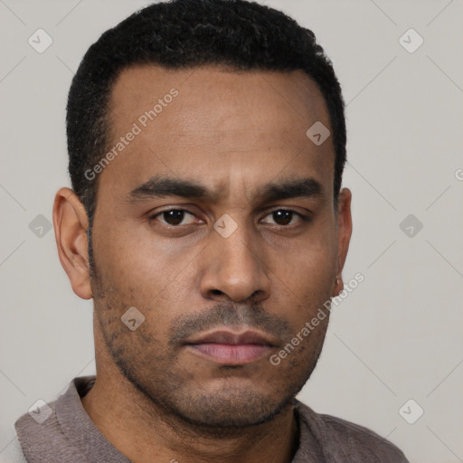 Neutral latino young-adult male with short  black hair and brown eyes