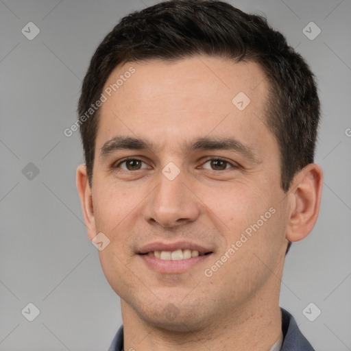 Joyful white young-adult male with short  brown hair and brown eyes