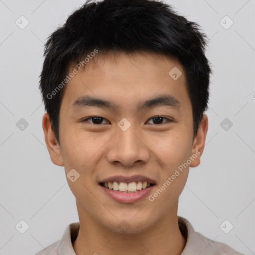 Joyful asian young-adult male with short  black hair and brown eyes