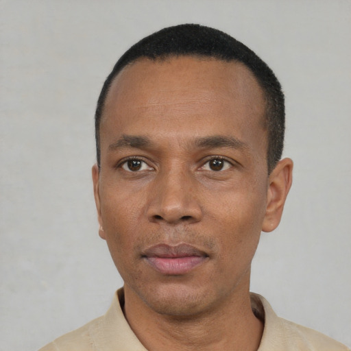 Neutral black adult male with short  black hair and brown eyes