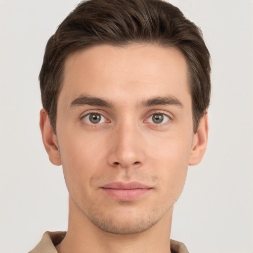 Neutral white young-adult male with short  brown hair and brown eyes