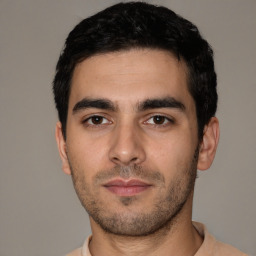 Neutral white young-adult male with short  black hair and brown eyes