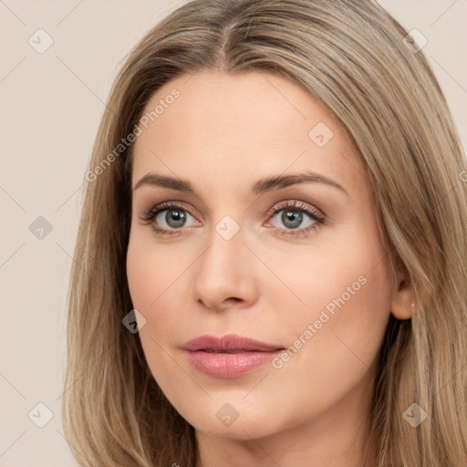 Neutral white young-adult female with long  brown hair and brown eyes