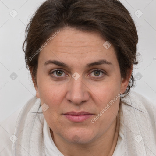 Joyful white adult female with short  brown hair and brown eyes