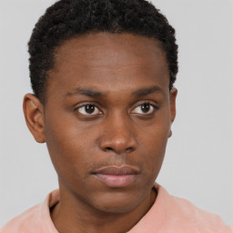 Neutral black young-adult male with short  brown hair and brown eyes