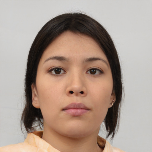 Neutral asian young-adult female with medium  brown hair and brown eyes