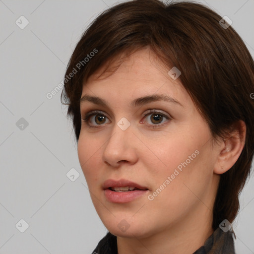 Neutral white young-adult female with medium  brown hair and brown eyes