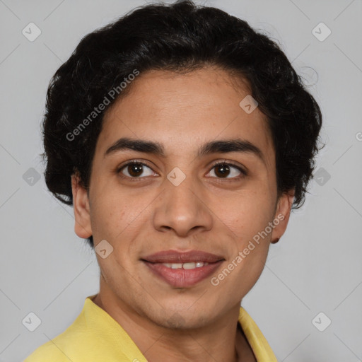 Joyful latino young-adult male with short  brown hair and brown eyes