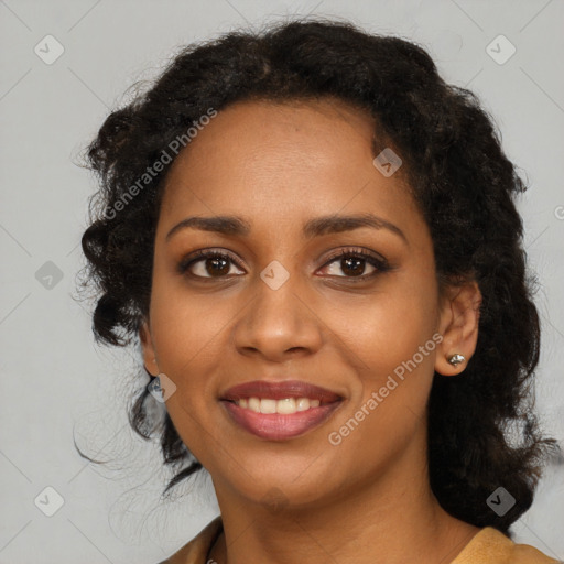 Joyful black young-adult female with medium  black hair and brown eyes