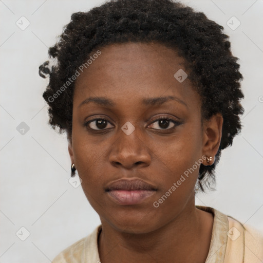 Neutral black young-adult female with short  black hair and brown eyes