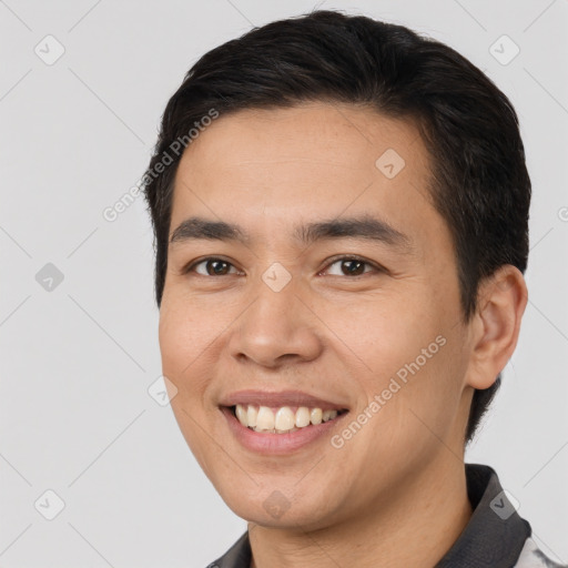 Joyful white young-adult male with short  brown hair and brown eyes