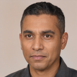 Neutral white adult male with short  black hair and brown eyes