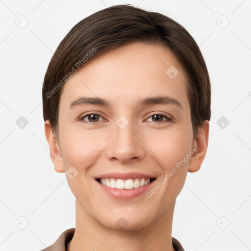 Joyful white young-adult female with short  brown hair and brown eyes