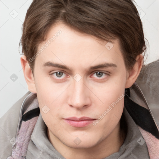 Neutral white young-adult male with short  brown hair and grey eyes