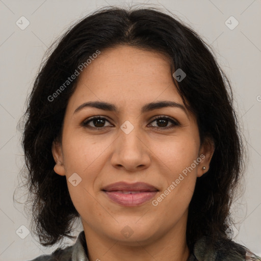 Joyful latino young-adult female with medium  brown hair and brown eyes