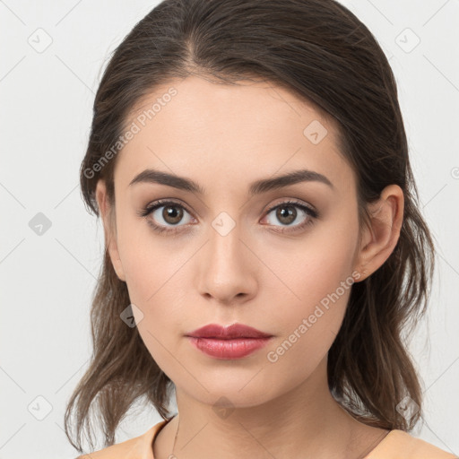 Neutral white young-adult female with medium  brown hair and brown eyes