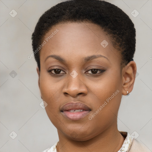 Joyful black young-adult female with short  brown hair and brown eyes