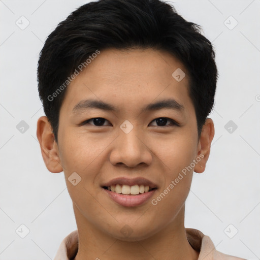 Joyful asian young-adult male with short  brown hair and brown eyes