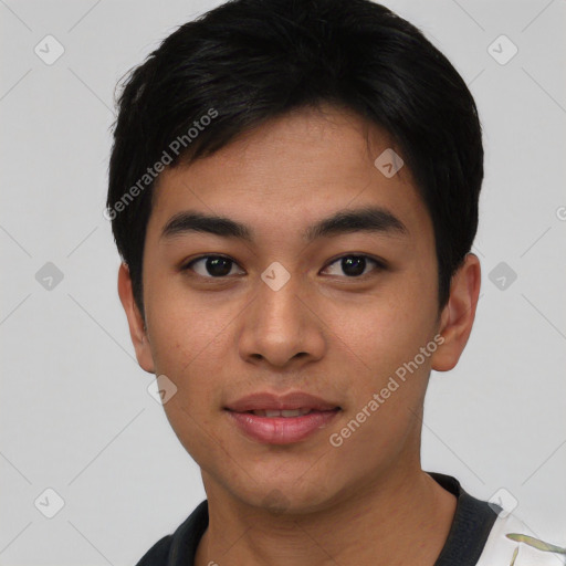 Joyful asian young-adult male with short  black hair and brown eyes