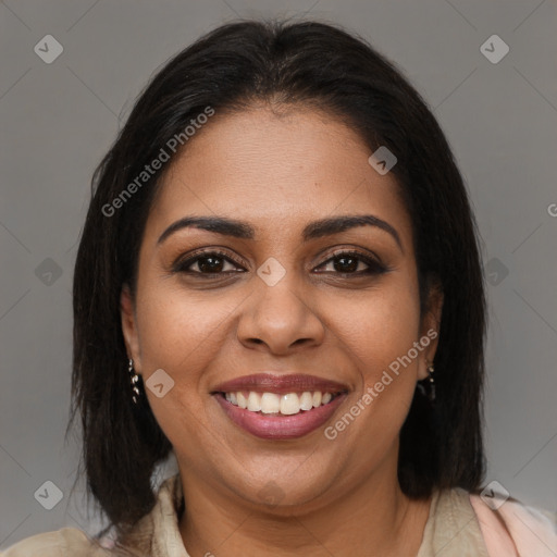 Joyful black young-adult female with medium  brown hair and brown eyes