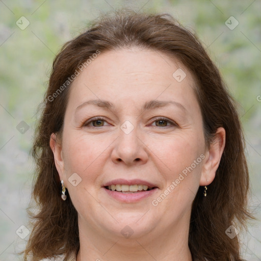 Joyful white adult female with medium  brown hair and brown eyes