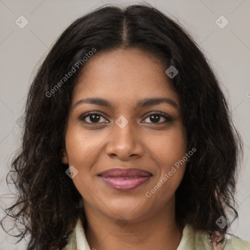 Joyful black young-adult female with medium  brown hair and brown eyes