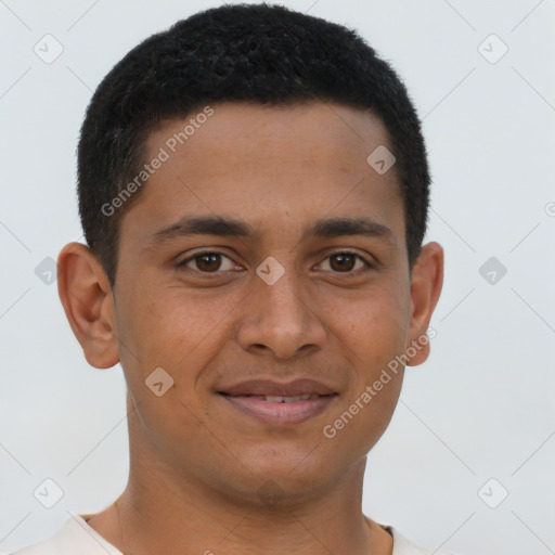 Joyful latino young-adult male with short  brown hair and brown eyes