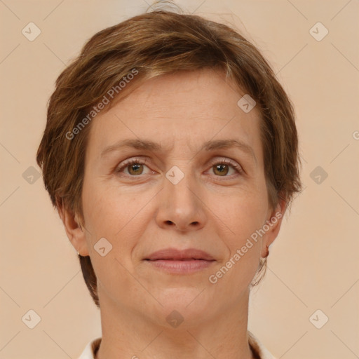 Joyful white adult female with short  brown hair and brown eyes