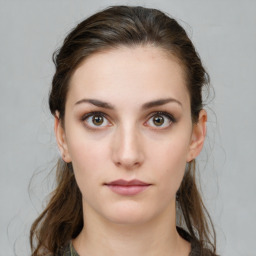 Neutral white young-adult female with medium  brown hair and brown eyes