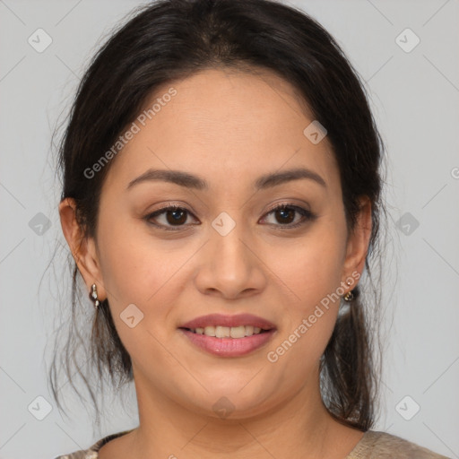 Joyful latino young-adult female with medium  brown hair and brown eyes