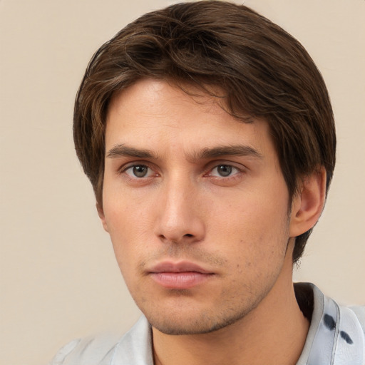 Neutral white young-adult male with short  brown hair and brown eyes