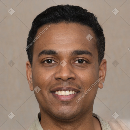 Joyful latino young-adult male with short  black hair and brown eyes